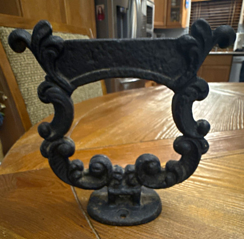 Ornate cast iron boot - iron, scraper